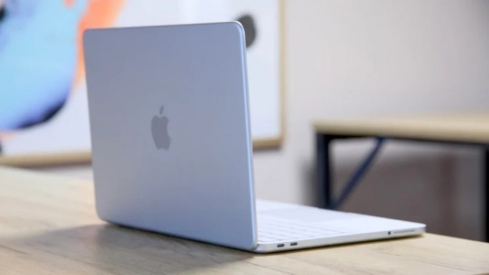Apple-MacBook-Neo-open-in-seliver-pictured-from-the-rear-left-quarter-scaled